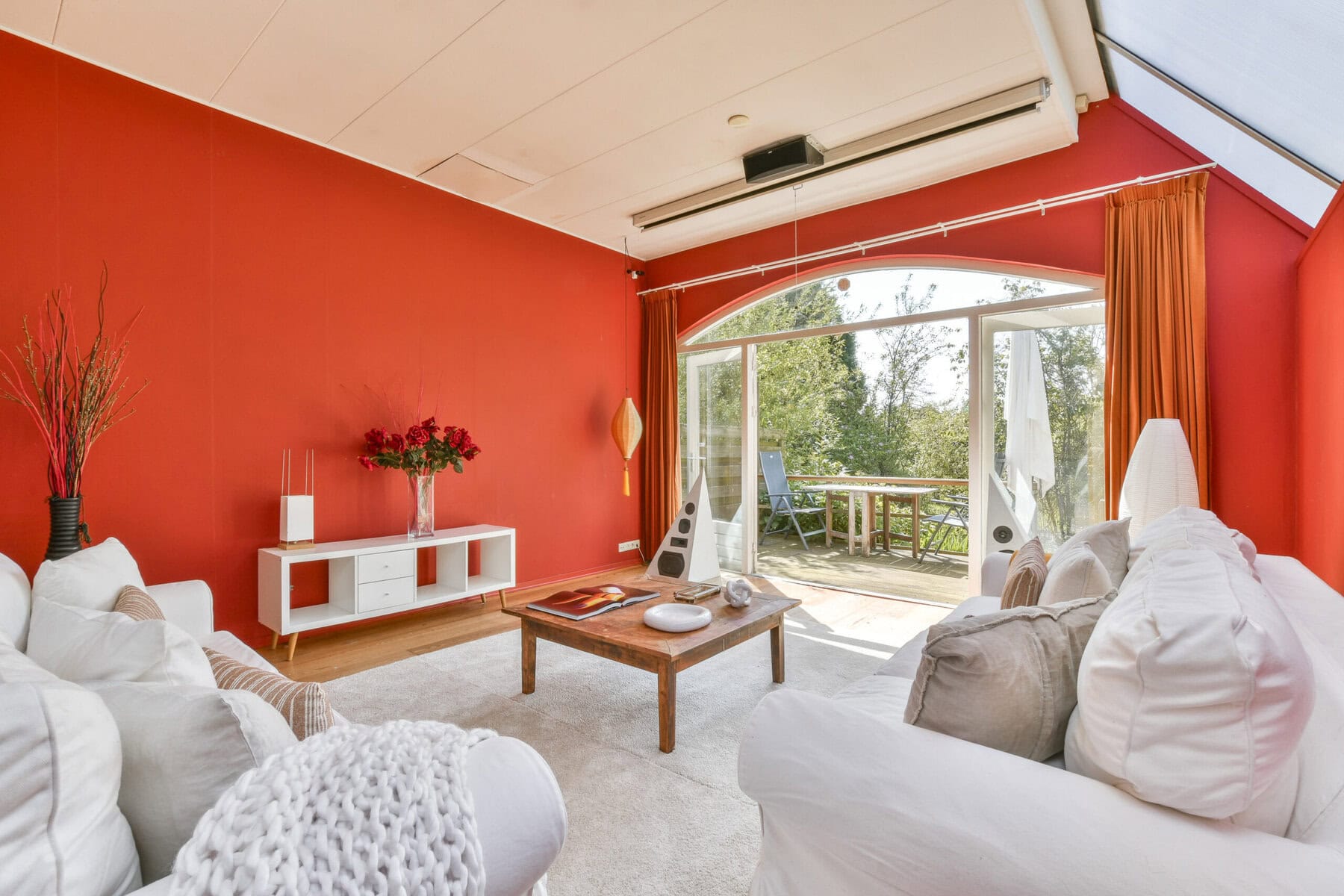 Bright living room with large glass doors at Sloterweg 1257 Amsterdam.
